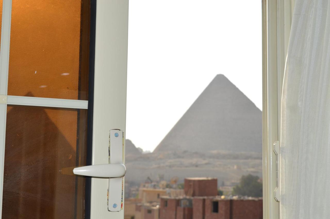 ホテル Magic Golden Pyramids View Kafret el-Gabal エクステリア 写真