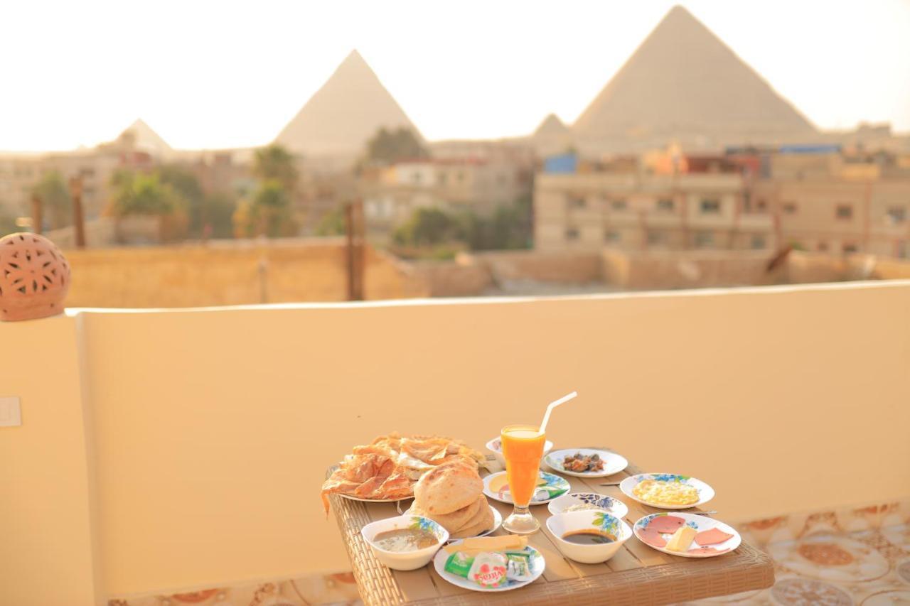 ホテル Magic Golden Pyramids View Kafret el-Gabal エクステリア 写真