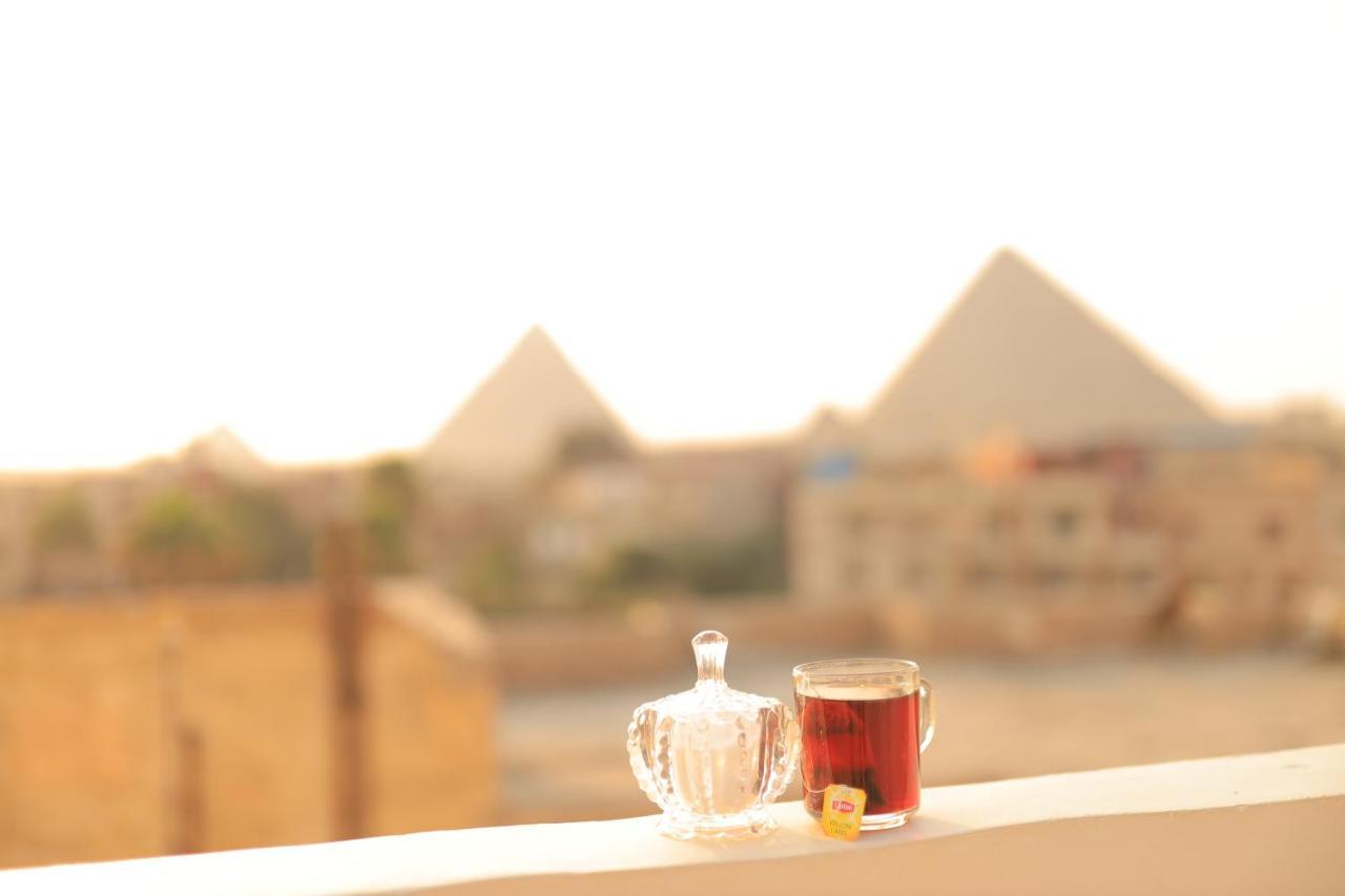 ホテル Magic Golden Pyramids View Kafret el-Gabal エクステリア 写真