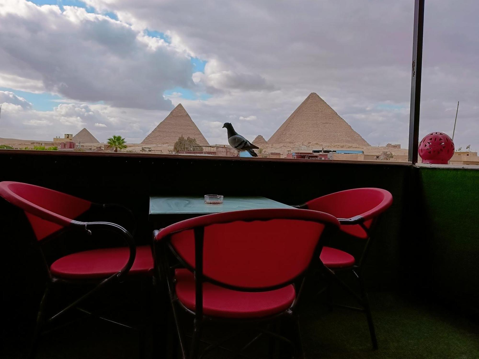 ホテル Magic Golden Pyramids View Kafret el-Gabal エクステリア 写真
