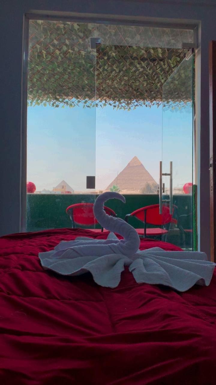 ホテル Magic Golden Pyramids View Kafret el-Gabal エクステリア 写真