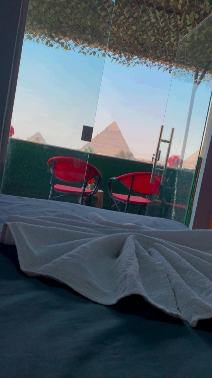 ホテル Magic Golden Pyramids View Kafret el-Gabal エクステリア 写真