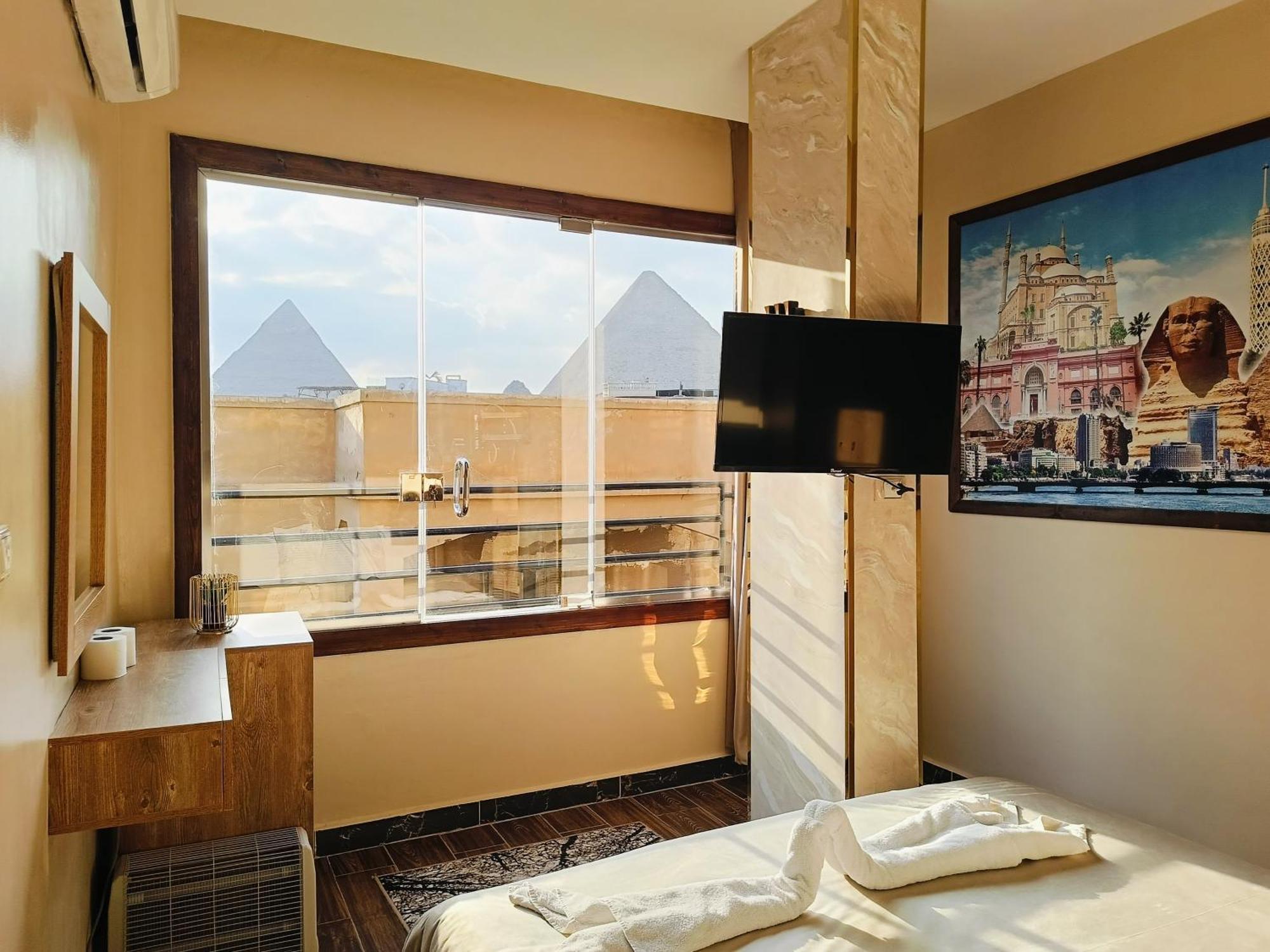 ホテル Magic Golden Pyramids View Kafret el-Gabal エクステリア 写真